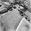 Oblique aerial view, taken from the NNW, centred on the tower-house.
