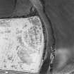 Oblique aerial photograph of Ballantrae Bridge taken from the NE, centred on the cropmarks of a possible enclosure, field boundaries and linear cropmarks.