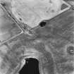 Soulseat Loch-Kirminnoch, oblique aerial view, taken from the SW, showing the cropmarks of a roman road and relating quarry pits.