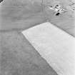 Carlton Mains, oblique aerial view, taken from the ESE, centred on the cropmark of an enclosure.