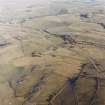 Oblique aerial view centred on the remains of rig, taken from the WSW.