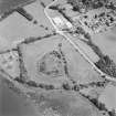 Oblique aerial view of Kirkcudbright Castle centred on earthworks, taken from the SW.