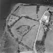 Oblique aerial view of Kirkcudbright Castle centred on earthworks, taken from the SSW.