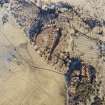 Oblique aerial view centred on the remains of the fort, taken from the SW.