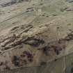 Oblique aerial view centred on the remains of the fort, taken from the SSE.