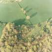 Oblique aerial view centred on the remains of the earthwork, taken from the WSW.