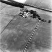 Bankhead, Dalswinton, oblique aerial view, taken from the NNE, centred on the cropmarks of Roman Forts and an oval enclosure.