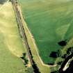 Oblique aerial view of Dalswinton, Bankhead, taken from the NW, centred on a linear cropmark.