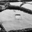 Oblique aerial view of Holywood centred on the excavation of a cursus, taken from the NE.