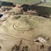Oblique aerial view centred on the remains of the fort, taken from the SW.
