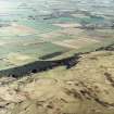 General oblique aerial view looking over the fort towards the River Annan, taken from the W.