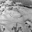 Oblique aerial view centred on the remains of the fort, taken from the SW.