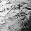 Oblique aerial view centred on the remains of the fort, taken from the ESE.