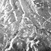 Raeburnfoot, oblique aerial view, taken from the SW, centred on the bank barrow.