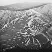 Shaw Hill, Calkin and Boyken Burn, oblique aerial view, taken from the NW, centred on two settlements and two linear earthworks.