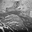 Boyken Burn, oblique aerial view, taken from the SSE, centred on a settlement.