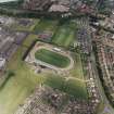 Oblique aerial view centred on the town's football ground, taken from the SW.