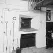 West Linton. Old Bake House. Interior.
View of oven and implements.