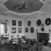 Interior view of Balcaskie House showing dining room with fireplace.