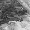 Oblique aerial view centred on the remains of St Andrews Castle.