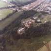 Oblique aerial view centred on Craig House, Old Craig House, South Craig Villa, Bevan House, East Craig and Queen's Craig.