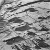 Bowhouse armament depot and factory, oblique aerial view, centred on production buildings and packing houses.