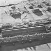 Bowhouse armament depot and factory, oblique aerial view, centred on loading warehouses.