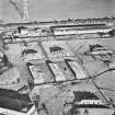 Bowhouse armament depot and factory, oblique aerial view, centred on production buildings and packing houses.