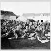 From Threave House album. Picnic group in unidentified location.