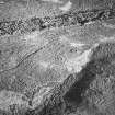 Torbeg, oblique aerial view, taken from the WNW, centred on two hut-circles.