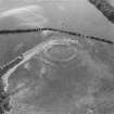Oblique aerial view of the remains of Dowan's Hill fort.