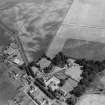 Oblique aerial view showing the cropmarks at Forteviot including enclosure, barrows, cemetery, pit-alignment and ring-ditch 3.
