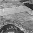 Oblique aerial view showing the cropmarks at Forteviot.
