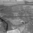 Oblique aerial view showing the cropmarks at Forteviot including the Roman temporary camp.