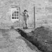 Kellie Castle Excavations
Black and white prints
Frame 9 - Whole trench, after excavation, with castle behind. From south.