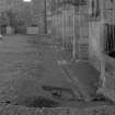 Falkland Palace Excavations
Frame 13 - View along drain F413 with central slab removed - from west
