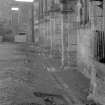 Falkland Palace Excavations
Frame 14 - View along drain F413 with central slab removed - from west