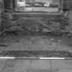 Falkland Palace Excavations
Frame 21 - Flagstones in recess of fifth window from south end of east range after removal of concrete from first floor level - from east

