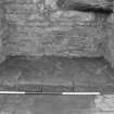 Falkland Palace Excavations
Frame 24 - Flagstones in recess of seventh window from south end of east range after removal of concrete from first floor level - from east
