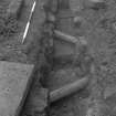 Falkland Palace Excavations
Frame 28 - Service pipes F408 and F412 cutting across channel F407 - from west
