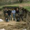 Photograph taken during the Council for British Archaeology 1987 Summer School. Working shot of the excavations showing team of workers.