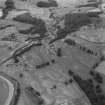 Oblique aerial view of the cropmarks at Carronbridge including a Roman temporary camp.