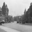 General view of High Street, Linlithgow, from W, showing Victoria Halls prior to dismantling of towers.