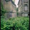 View from N showing remains of quadrant screen wall and main block, Mavisbank House.