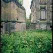 View from N showing remains of quadrant screen wall and main block, Mavisbank House.