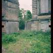 View from N showing remains of quadrant screen wall, Mavisbank House.