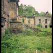 View from SE showing remains of front steps, quadrant screen wall and pavilion, Mavisbank House.