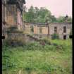 View from SE showing remains of front steps, quadrant screen wall and pavilion, Mavisbank House.