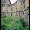 View from NE showing remains of main block and quadrant screen wall, Mavisbank House.