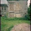 View from NE showing remains of pavilion with main block in background, Mavisbank House.